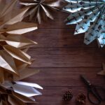white paper boats on brown wooden floor